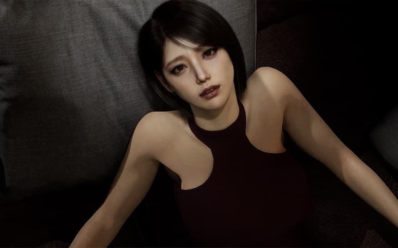 In-game: Yujin in full 3D, leaning back on a sofa and looking up at you